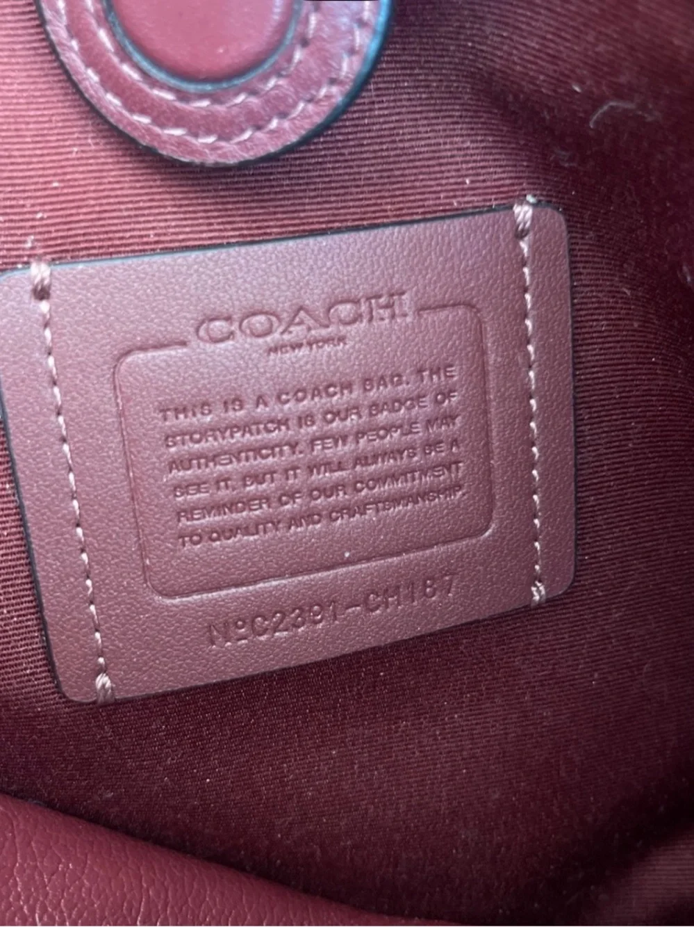 Coach Black Pebbled Leather Tote with Burgundy Interior